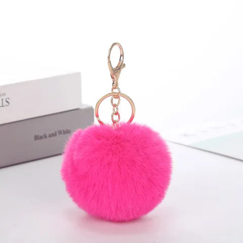 Porte clés Pompon fourrure synthétique Fuchsia