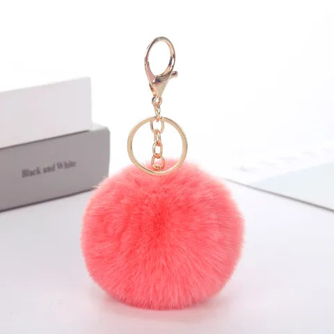 Porte clés Pompon fourrure synthétique Pêche